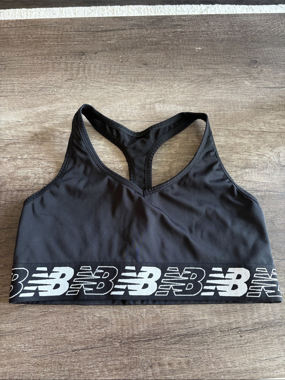 New Balance Black Sports Bra with White Logo Band